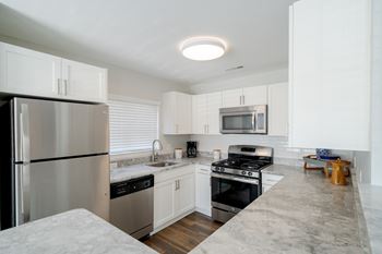 Modern kitchen at the residences at stevens pond in saugus, ma 01906